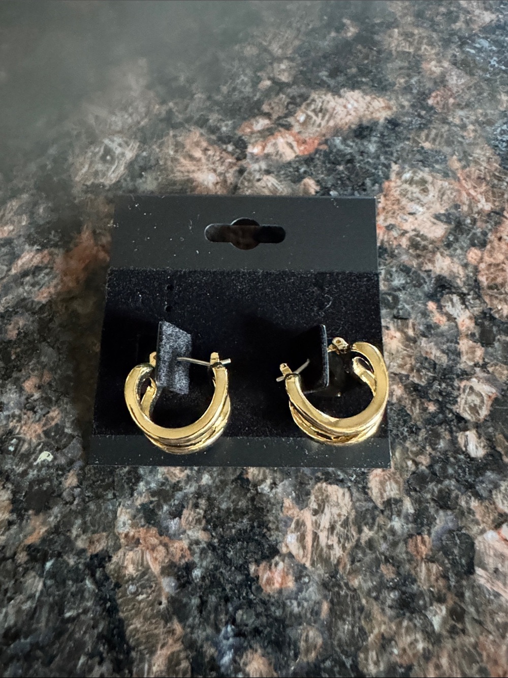 Gold Tone Twisted Hoop Earrings - Women's Jewelry
